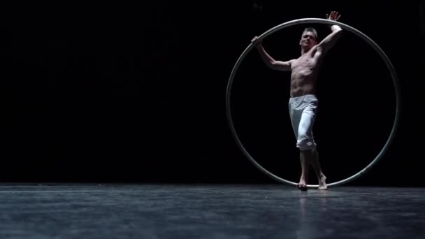 Muscular Circus Artist Perform Cyr Wheel Black Background Concept Originality — ストック動画