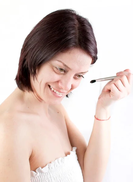 Γυναίκα που βάζει μακιγιάζ — Φωτογραφία Αρχείου