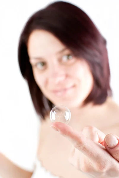 Woman holding bubble — Stock Photo, Image