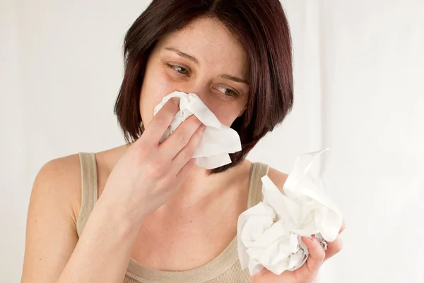 Woman sneezing — Stock Photo, Image