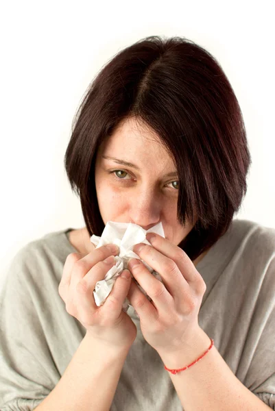 Woman sneezing — Stock Photo, Image