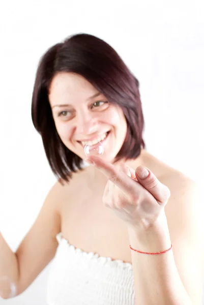 Woman holding bubble — Stock Photo, Image