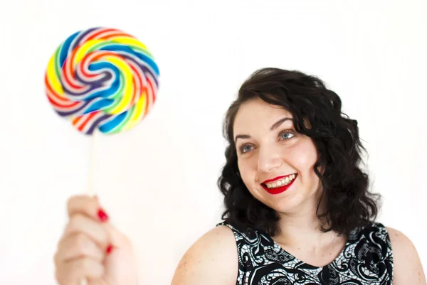 Retro woman with a lollipop — Stock Photo, Image