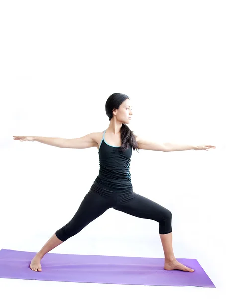 Hermosa chica practicando yoga —  Fotos de Stock