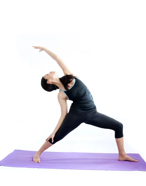 Hermosa chica practicando yoga — Foto de Stock