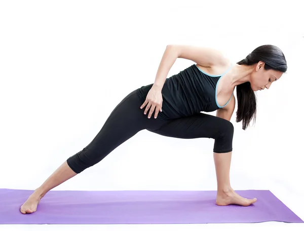 Hermosa chica practicando yoga — Foto de Stock