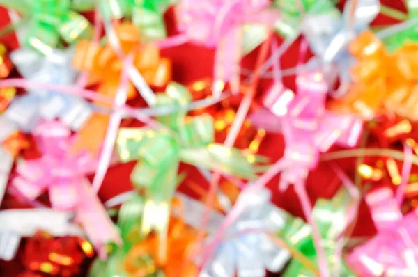 Colorful ribbons close up, unfocus shot background — Stock Photo, Image