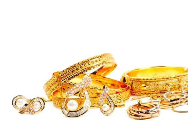 Golden precious jewelry , isolated on white background — Stock Photo, Image