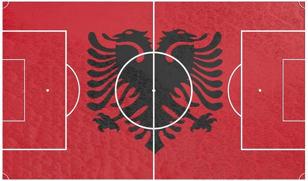Albania flag on football field — Stock Photo, Image
