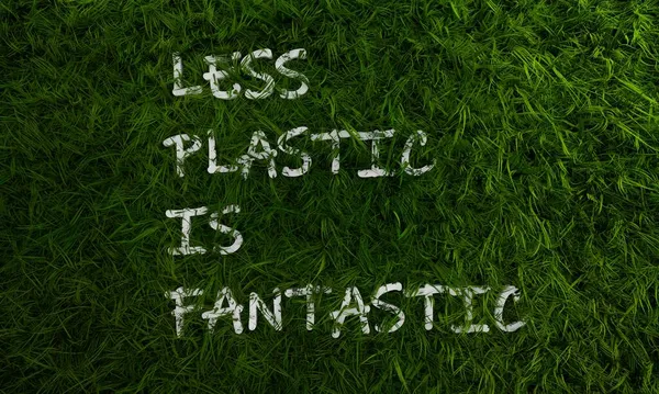 Rumput hijau 3d dan plastik kurang adalah teks fantastis — Stok Foto