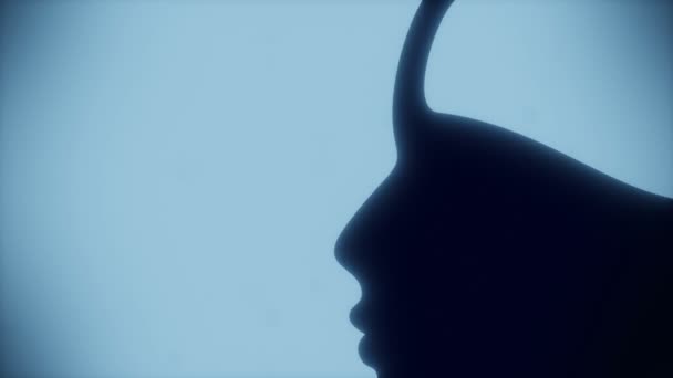 Silhouette of the young posing lady inside the head of a man.