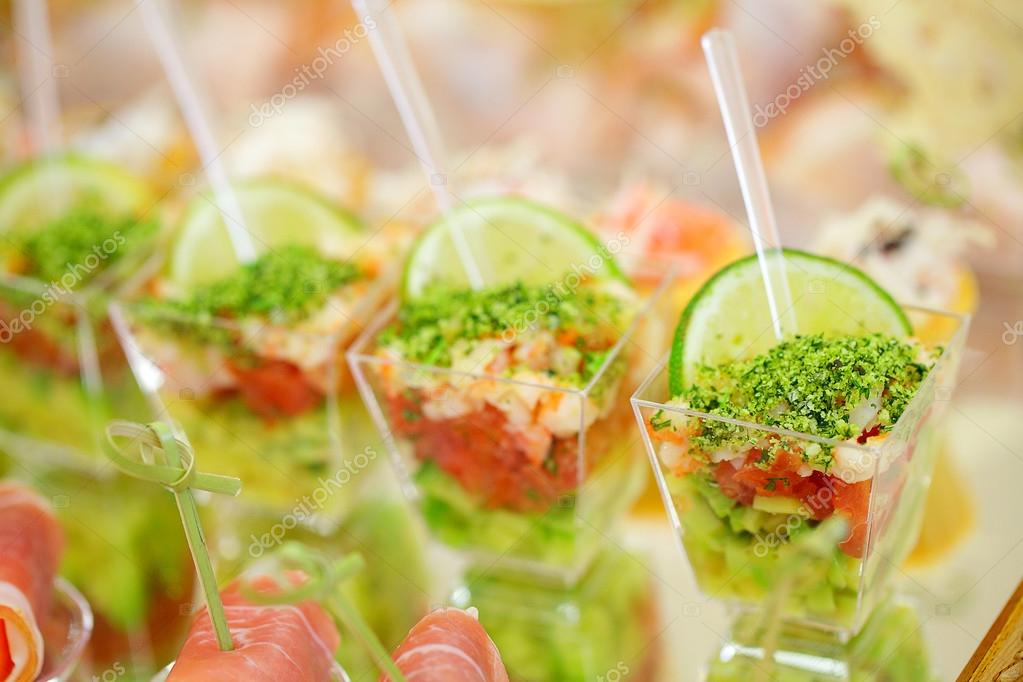 Appetizers, gourmet food vegetable salad and prosciutto, cater