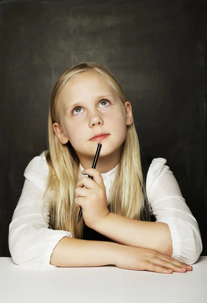 Pupil thinking in classroom, education concept — Stock Photo, Image