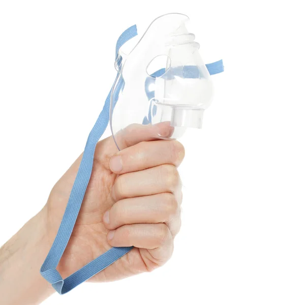 Oxygen mask in male hand on white — Stock Photo, Image