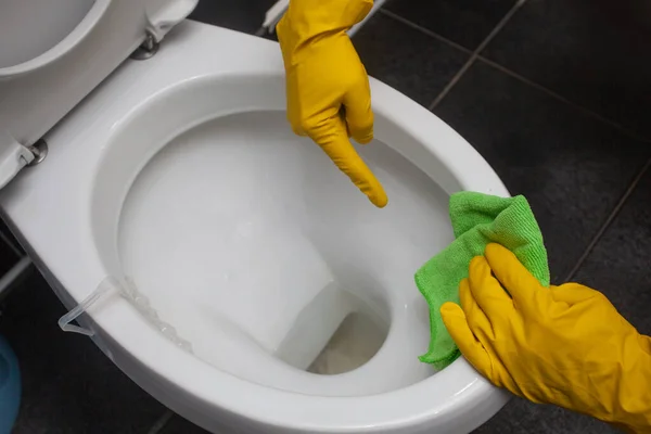 Female Hand Yellow Rubber Glove Cleaning White Toilet Bowl Using — Foto de Stock