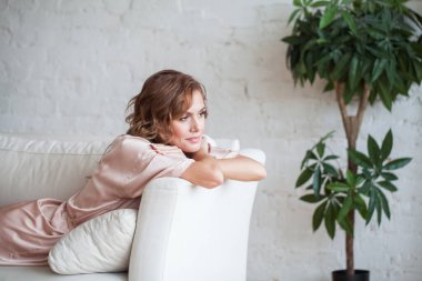 Beauty woman dreaming and relaxing at home