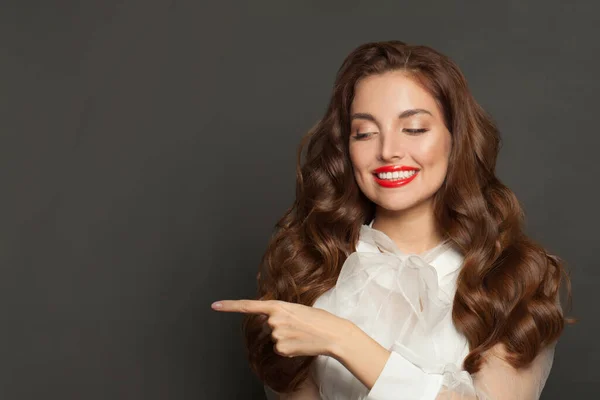 Happy Lady Pointing Aside Smiling Black Background — Stok fotoğraf