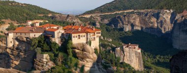 Panorama of Meteora rock cliff with monastery in Greece