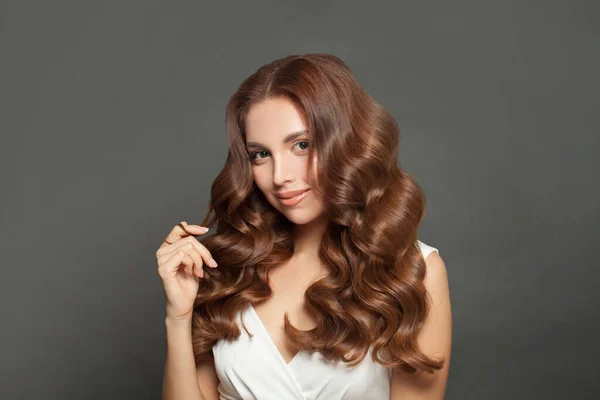 Beautiful Young Woman Touching Her Long Wavy Shiny Hair Brunette — Fotografia de Stock