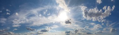 Cloudscape skyline. Blue day sky with clouds