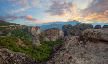 Beautiful view of Meteora Kalabaka in Greece, sunset sky clouds and mountain