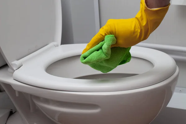 Man Wearing Glove Cleaning Toilet Bowl Bathroom Closeup — Foto de Stock