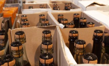 Sparkling wine. Bottles with corks in box