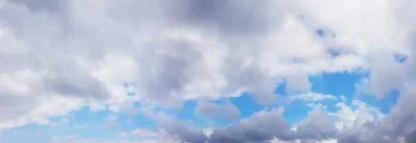 Clouds background. Sky with floating clouds