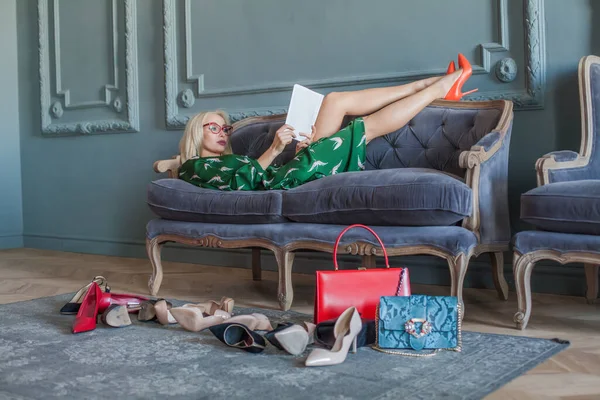 Blonde Woman Reading Fashion Magazine Home Vogue Concept —  Fotos de Stock