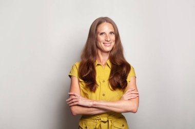 Charming elegant confident businesswoman smiling at the camera