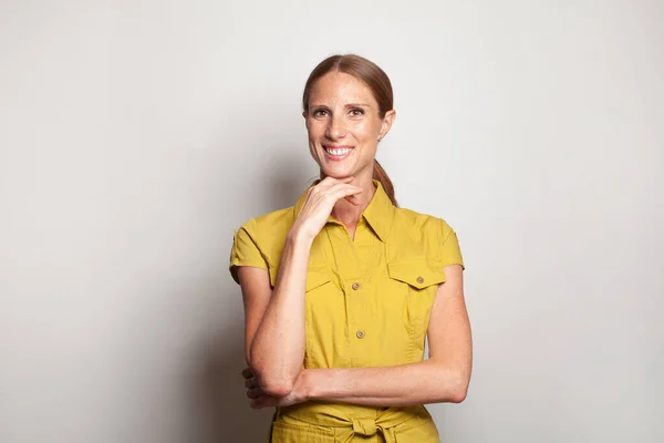 Portrait Middle Aged Businesswoman Yellow Shirt White Background — Fotografia de Stock