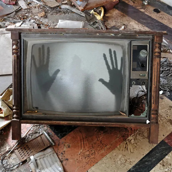 Ghost appears on flickering tv set — Stock Photo, Image