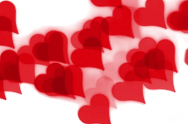 Coração vermelho bokeh padrão — Fotografia de Stock