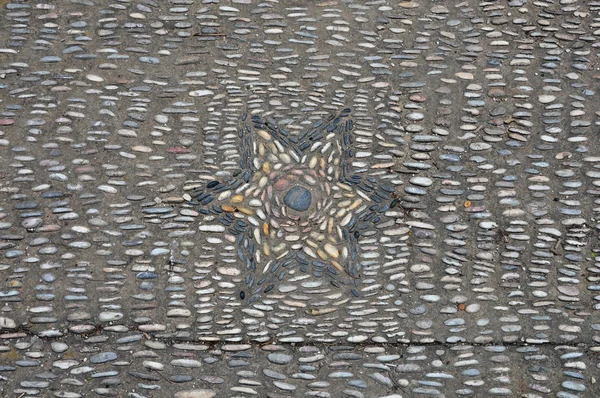 Oblázkové mozaiky hvězda — Stock fotografie