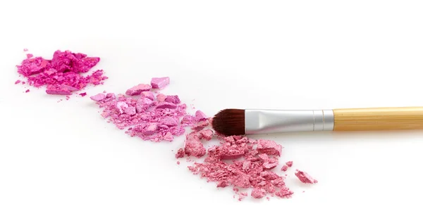 Pink shiny eye shadows and brush — Stock Photo, Image