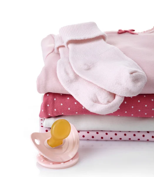 Hög med rosa babykläder — Stockfoto