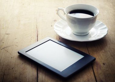 E-book reader and coffee clipart