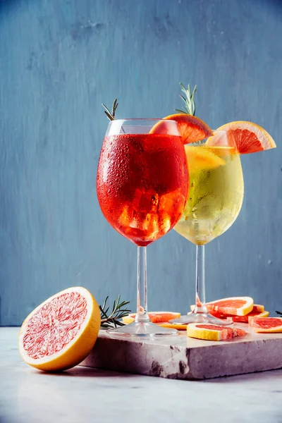 Red White Aperol Spritz Garnish Wine Glasses Rosemary Grapefruit Luxury — стоковое фото