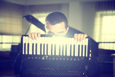 a man with an accordion