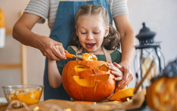 Happy Family Preparing Halloween Grandmother Granddaughter Carving Pumpkins Home — Stock Photo, Image