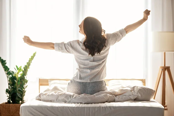 Happy Young Woman Enjoying Sunny Morning Bed — Stock Photo, Image