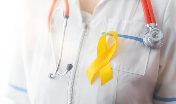 World Childhood Cancer Day Doctor Golden Ribbon — Stock Photo, Image