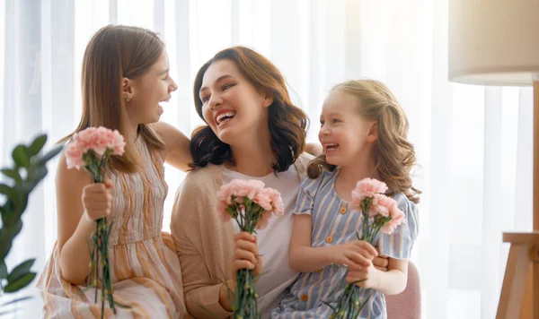 Happy Day Children Daughters Congratulating Mother Giving Her Flowers Mum — Stock Photo, Image