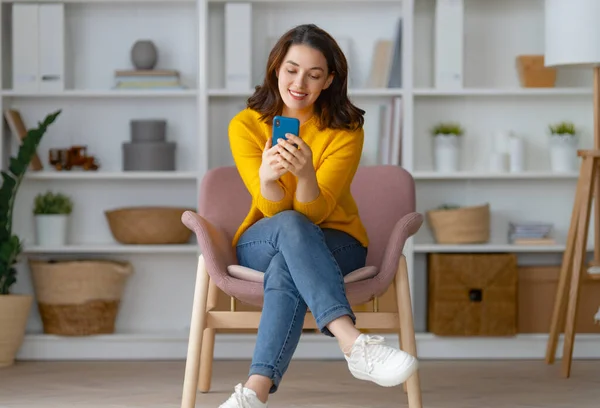 Happy Casual Beautiful Woman Using Phone Sitting Armchair Home — Stock Photo, Image