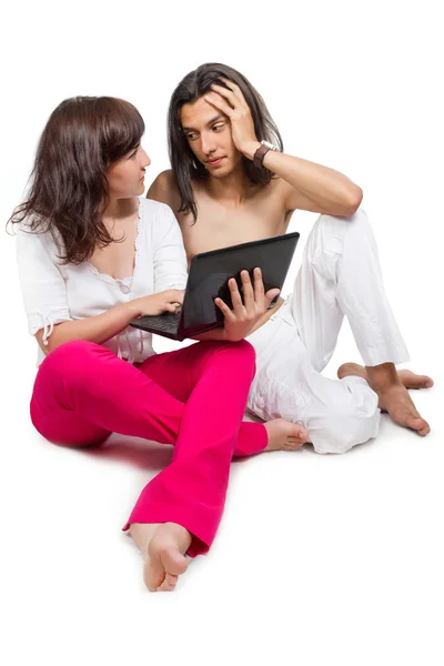 Young couple with the computer — Stock Photo, Image