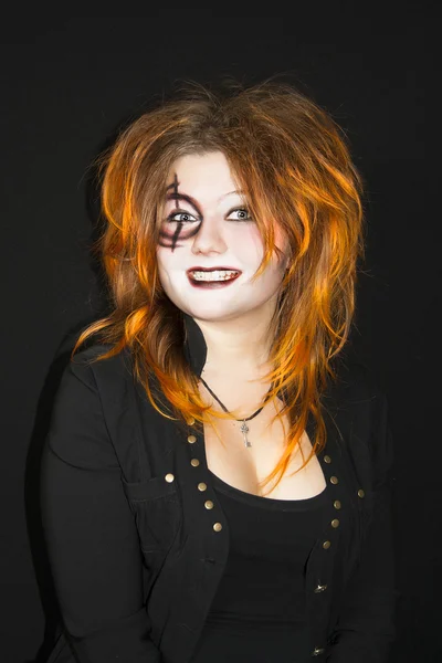 Dia das Bruxas. Maquiagem em uma cara da mulher jovem — Fotografia de Stock