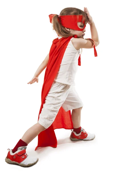 Niño superhéroe en un rojo — Foto de Stock