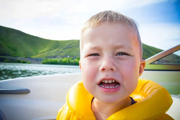 Travel of children on water in the boat — Stock Photo, Image