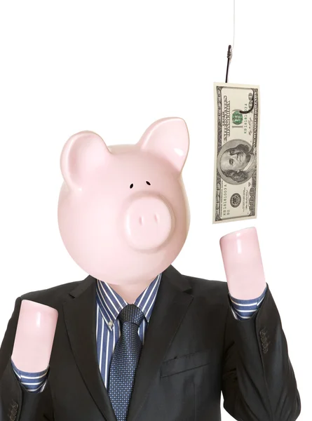 Businessman with a piggy bank head — Stock Photo, Image