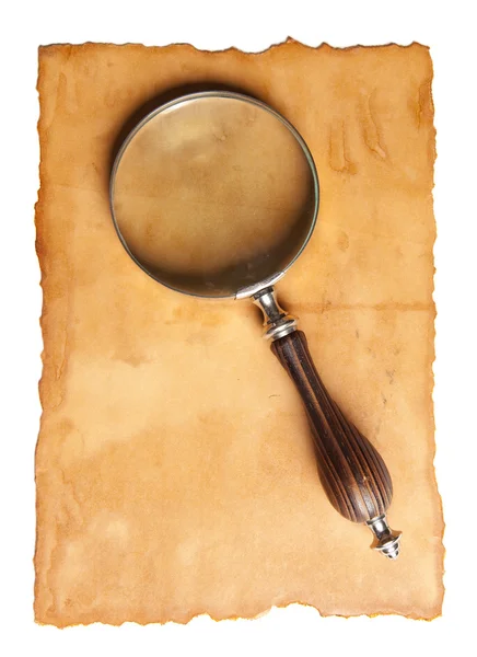 Magnifying glass and old paper — Stock Photo, Image